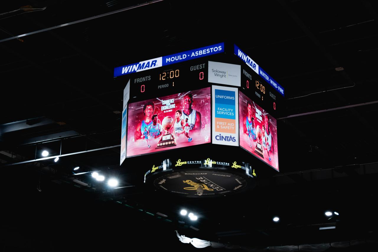 a big screen in the middle of a dark room